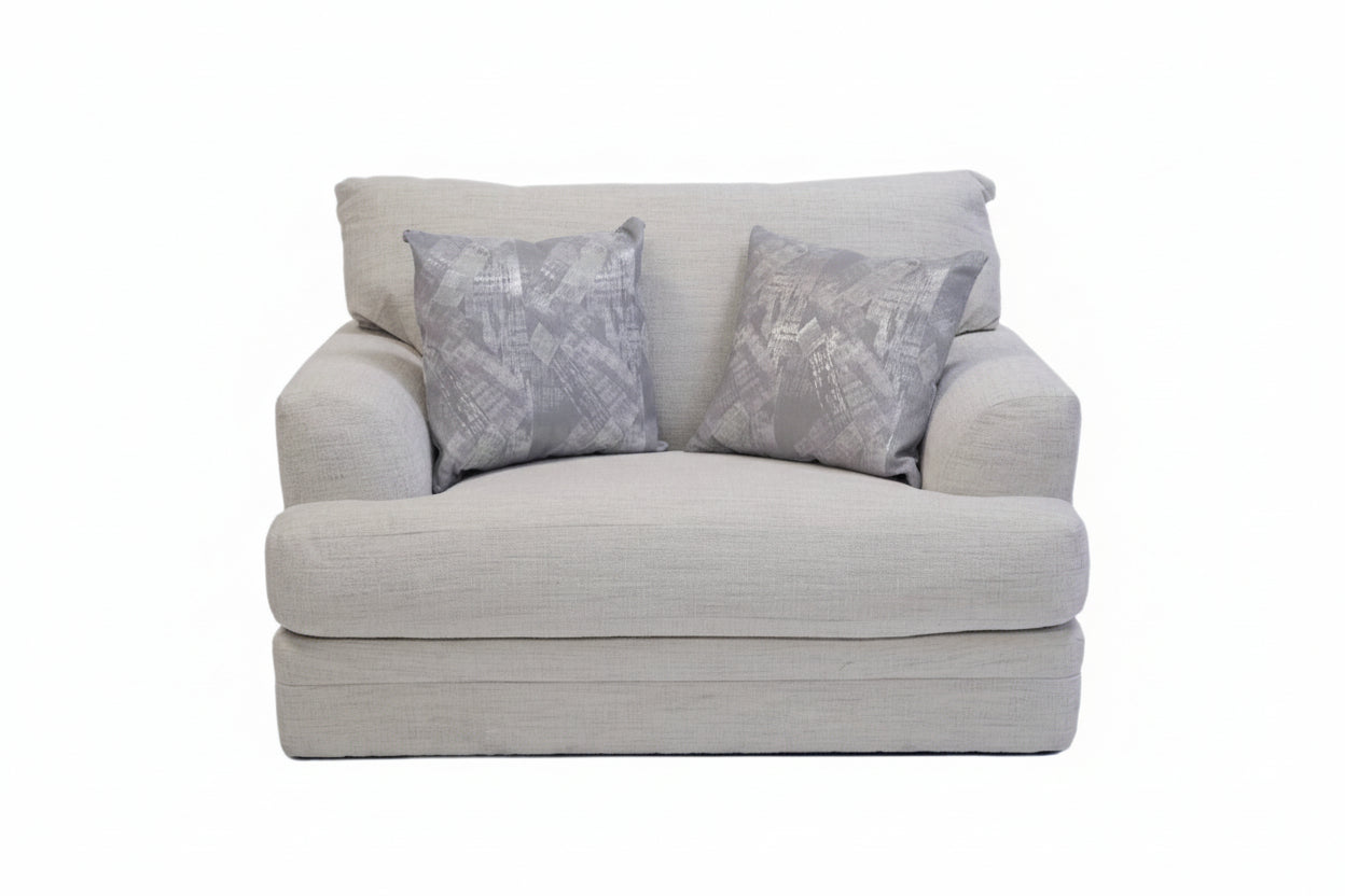 White sofa with decorative pillows on a white background