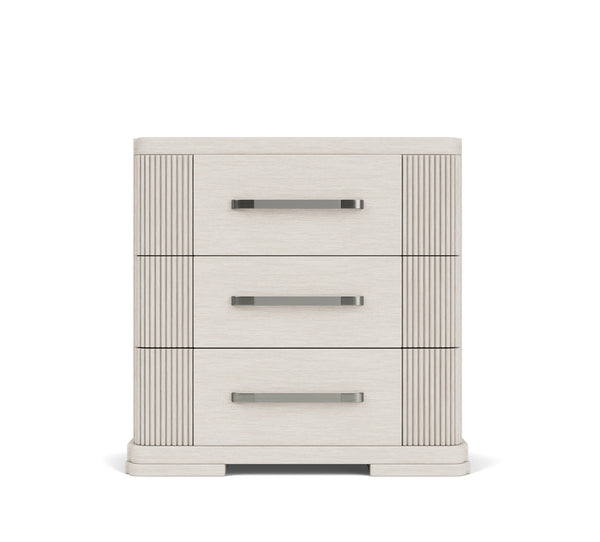 Three-drawer nightstand with decorative paneling on a white background