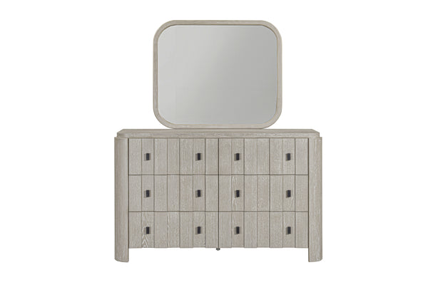 Wooden dresser with a matching mirror on a white background