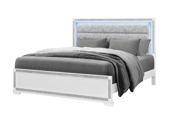 Gray upholstered bed with decorative headboard on a white background