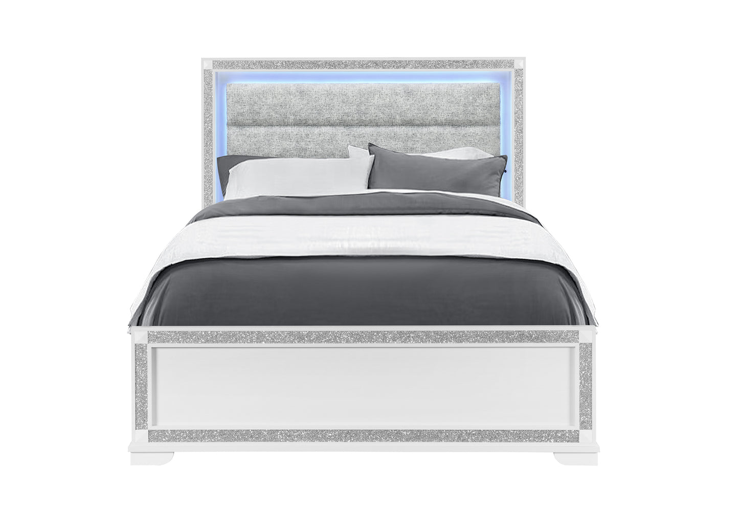 Bed with gray bedding and decorative headboard on a white background