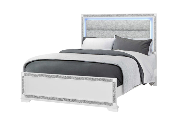 Bed with decorative headboard and bedding on a white background