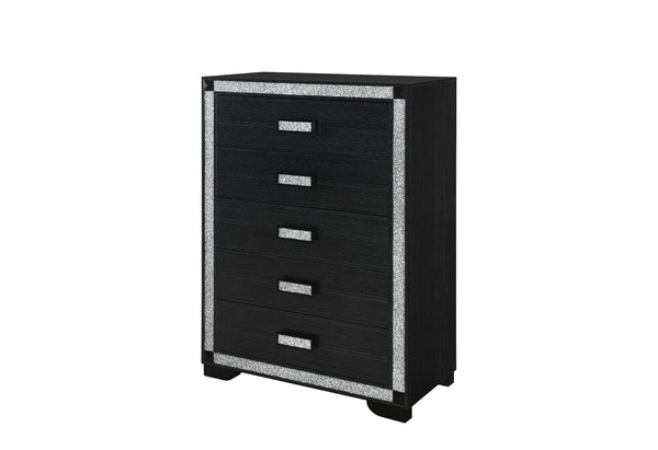 Black dresser with silver trim on a white background