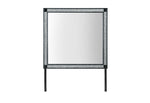 Rectangular mirror with decorative frame on a white background