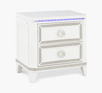 White nightstand with two drawers and LED lighting on a white background