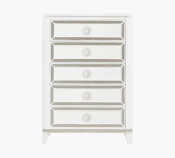 White dresser with decorative trim on a white background