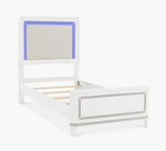 The Tiana Upholstered Twin Bed combines dazzling ambient LED lighting controlled by touch switches on all pieces