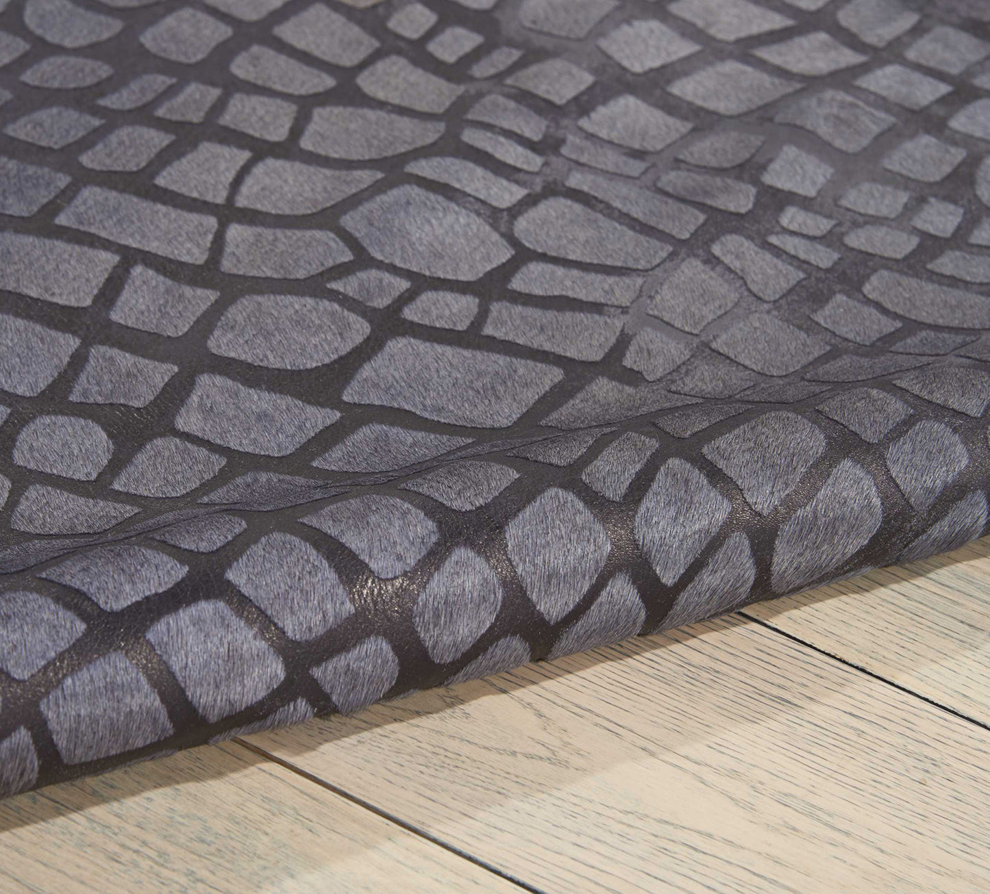 Crocodile print grey couture rug